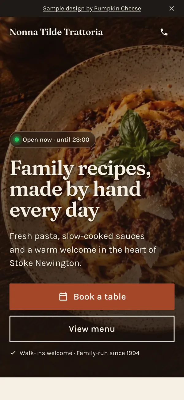 Phone screenshot of the restaurant sample site, with an open now badge and a book a table button.